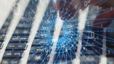 Computer man programmer or hacker prints a code on a laptop keyboard to break Stockbeeldmateriaal 120869739