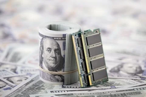 Computer memory ram on hundred dollar bills banknotes. Stock Photos