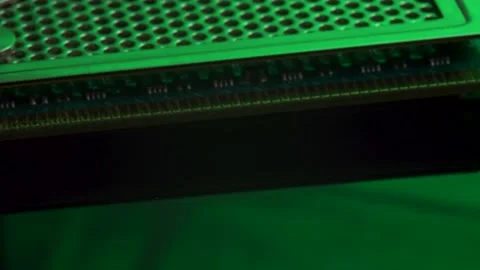Computer memory RAM module on green light mirror background Stock Footage 154470861