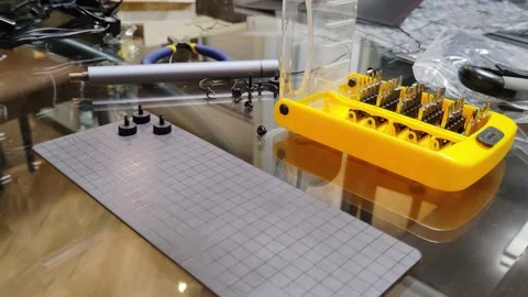 Computer metal self tapping screws falling on magnet mat, spill out screw Stock Footage 302347082