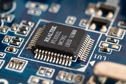 Computer microchip close up on motherboard Stock Photos