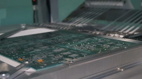 Computer microchip manufacturing on modern industrial equipment Stock Footage 121226700