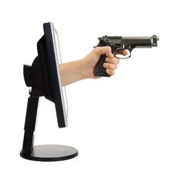 Computer monitor and hand with gun Stock Photos