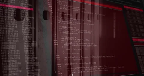 Computer monitor displaying code and terminal streams, featuring red tinted Stock Footage 309145762