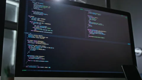 Computer Monitor Displaying Programming Code for Software Development Stock Footage 348344167