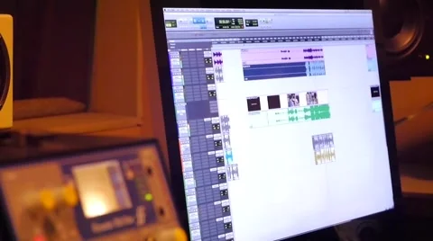 Computer monitor with music graphic equalizers in sound room production Stock Footage