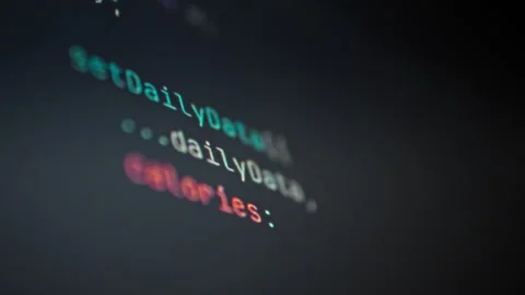 On a computer monitor screen a rapid sequence of numbers and symbols streams Stock Footage 331475083