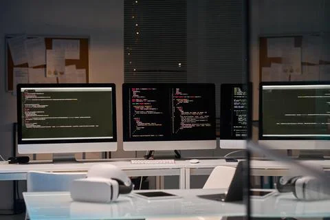 Computer Monitors with Code Stockfoto's