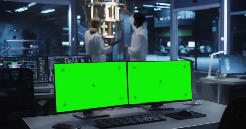 Computer Monitors with Green Screen in Research Office Stock Footage 318967441