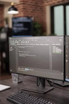 Computer monitors showing source code Stockfoto's