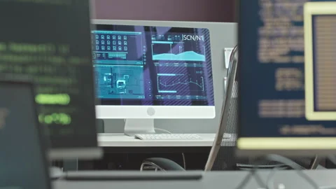 Computer Monitors with Sophisticating Codes in Programmer Office Stock Footage 247620294