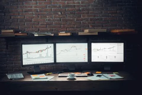 Computer monitors on table isolated trader work concept Stock Photos