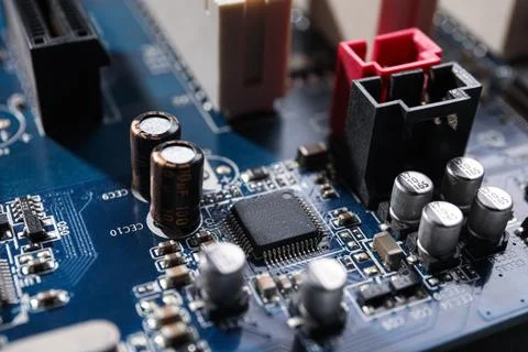 Computer motherboard as background, closeup. Electronic device Stock Photos