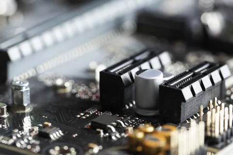Computer motherboard as background, closeup. Electronic engineering Stock Photos