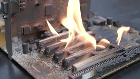Computer motherboard ,circuit board is on fire to burn,flame. short circuit Stock Footage 143479831