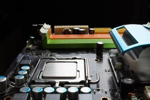 Computer motherboard close up on black background Stock Photos