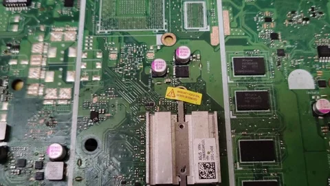 Computer motherboard electronic circuit components close up Stock Footage 348227396