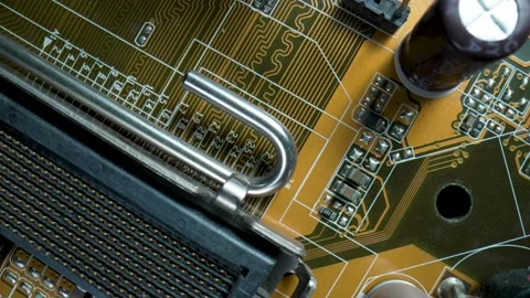 Computer motherboard microcircuit with chips, slots, transistors, resistors and Stock Footage 182382993