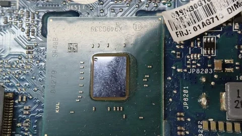 Computer motherboard microprocessor chip close up Stock Footage 348226404