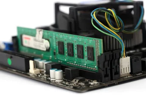 Computer motherboard with ram and cables inside Stock Photos
