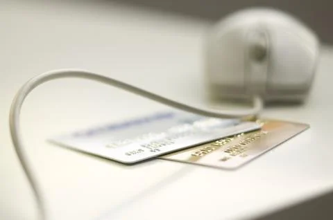 Computer mouse and credit cards Foto stock