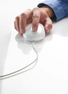 Computer mouse and hand Stock Photos
