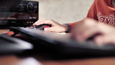 Computer mouse and keyboard child Stock Footage 131391291