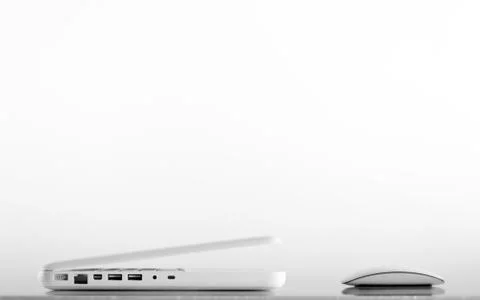 Computer mouse and laptop Foto stock