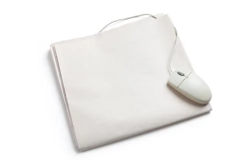 Computer mouse and Newspaper Stock Photos