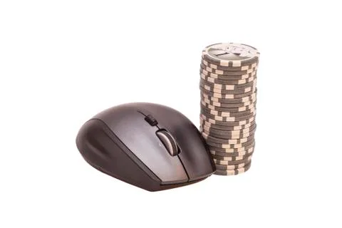 Computer mouse and pile of gambling chips. Online internet casino 写真素材