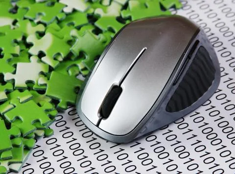 Computer mouse and  puzzles on a binary code 스톡 사진