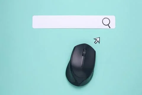 Computer mouse on a blue background with search bar Stock Photos