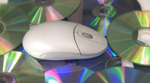 Computer mouse CD DVD rotate Stock Footage 653393