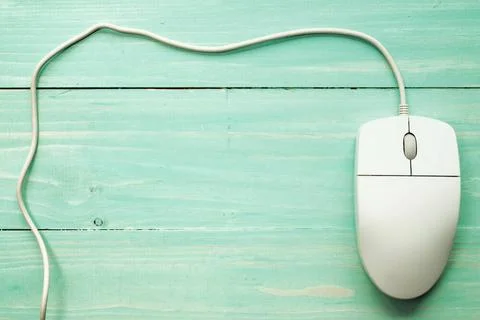Computer mouse with copy-space Computer mouse on the wooden background wit... Foto stock