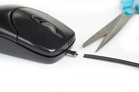 Computer  mouse with cut off cable on a white Stock Photos
