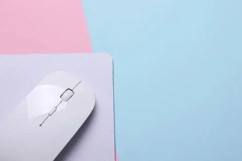 Computer mouse on desk with pastel background for technology Stock Photos
