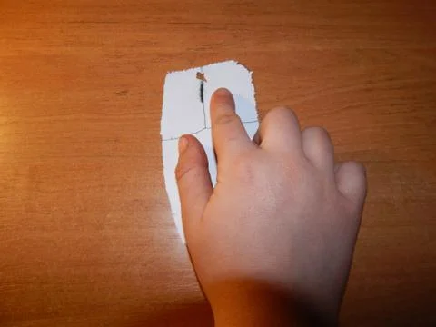 Computer mouse is drawn and cut out of paper Stock-Fotos