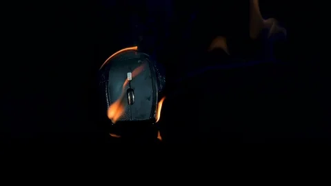 Computer mouse on fire - black background Video stock 86790706