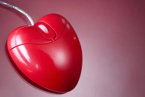 Computer mouse in form of heart in isolation Stock Photos