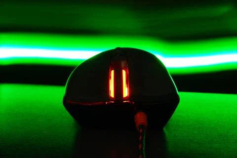 Computer mouse glows in the dark Stock Photos