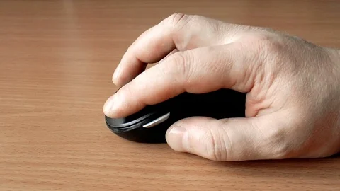 Computer mouse in hand Stock Footage 79851869
