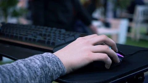 Computer mouse in the hands of a gamer Stock Footage 106604054