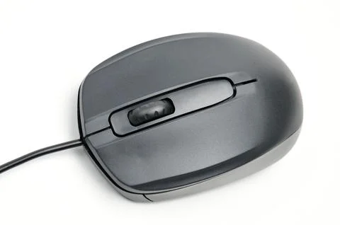 Computer mouse for issuing commands and controlling applications on a white.. Stock Photos