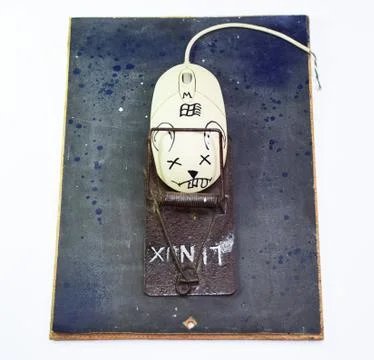 Computer mouse is a man in a mousetrap. Humorous collage in the sphere of i t Foto stock