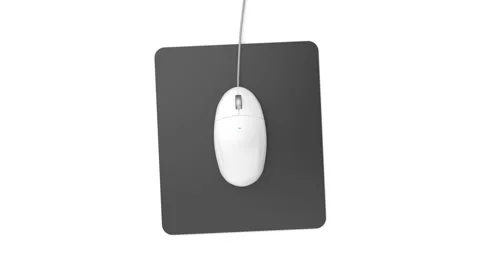 Computer mouse on mouse pad Video stock 293847442