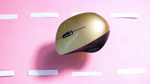 The computer mouse moves on a pink background, as if on a road Stock Footage 154743918
