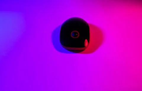 Computer mouse in neon light, ultraviolet light, photo taken in a photo studi Stock Photos