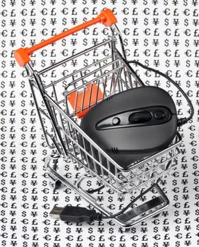 Computer mouse  in  shopping trolley Stock Photos