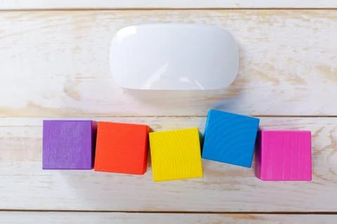 Computer mouse on a wooden background Stock Photos