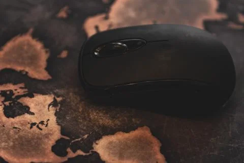 Computer Mouse on World Map Globe Mousepad Stock Photos